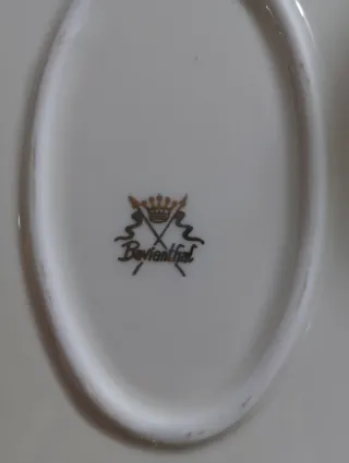 Servizio piatti in ceramica con pesci