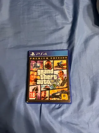 PS4 Slim Negra + Volante y Juegos