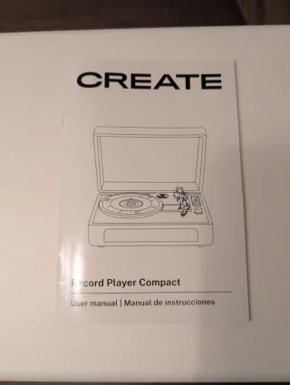 Tocadiscos compacto beige y negro