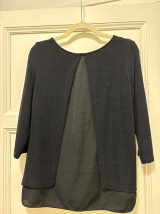 Blusa negra con brillo