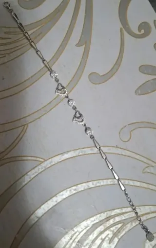 Pulsera de plata con corazones y circonitas