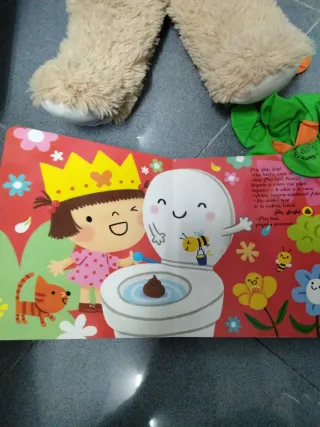 Peluche perro y libro interactivo infantil