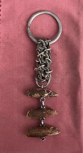 Amuleto semillas dátil hilado plata