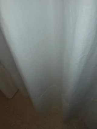 Barra de hierro con cortinas