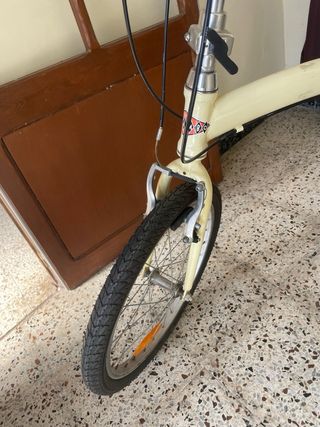 Bicicleta plegable color verde crema