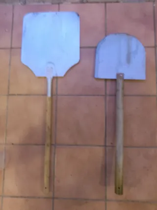 Palas para pizza de metal y madera