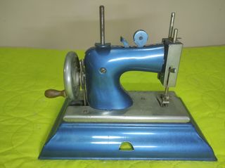 Máquina de coser antigua de juguete Casige