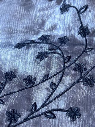 Bolso fiesta negro con flores y transparencias