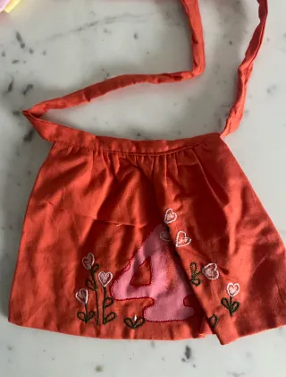 Accessori My Doll: grembiulini numerati