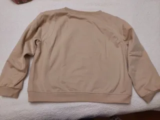Sudadera chica beige con perro