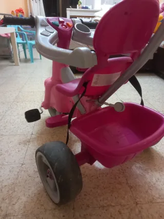 Triciclo infantil rosa y gris