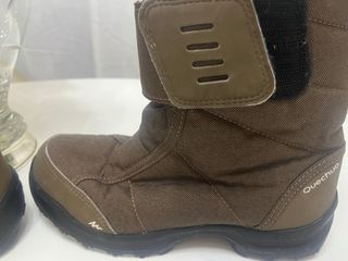 Botas de nieve Quechua marrones y naranjas