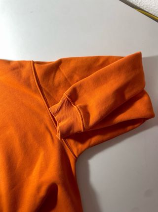 Sudadera naranja con mensaje Shine for yourself