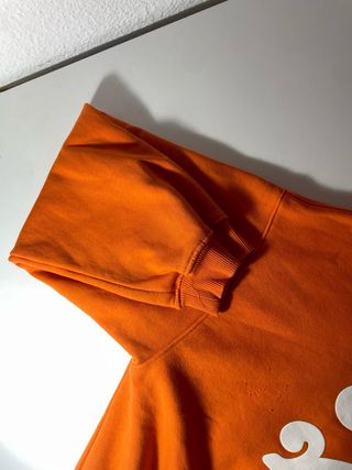Sudadera naranja con mensaje Shine for yourself