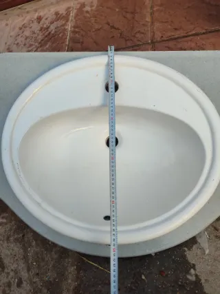 Lavabo de mármol y porcelana