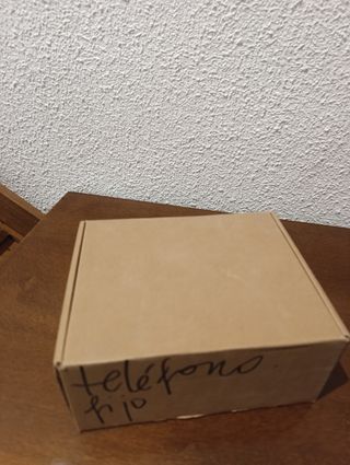 Teléfono Motorola + Base + Cargador