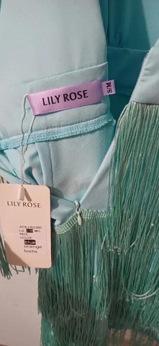 Vestido turquesa flecos