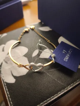 Pulsera Swarovski Corazón Infinito Oro y Plata