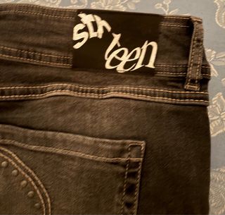Jeans Bootcut Low Waist Tachas Negro/Gris