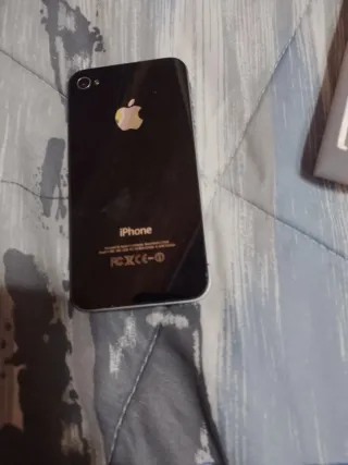 iPhone 4S Plata.  Leer el anuncio.