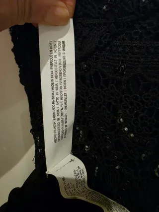 Miniabito nero macramè con paillettes