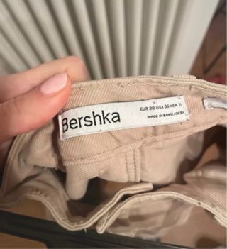 Minigonna beige con pieghe