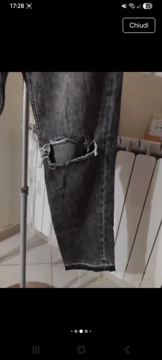 Jeans grigi strappati