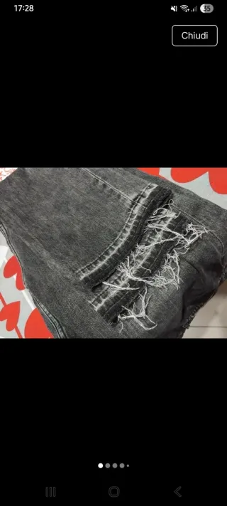 Jeans grigi strappati