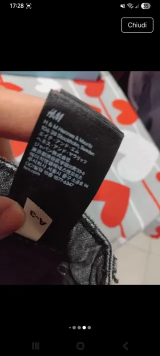 Jeans grigi strappati