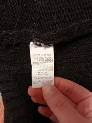 Maglia nera donna con trecce