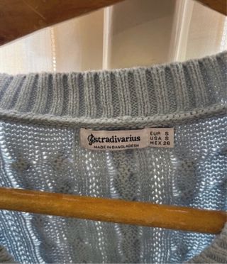 Gilet azzurro a trecce