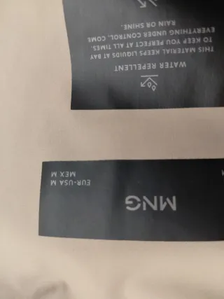 Cazadora bomber beige y gris