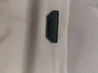 Cazadora bomber beige y gris