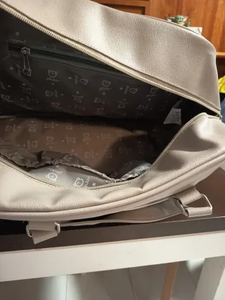 Pañalera gris regalo porta biberón termico