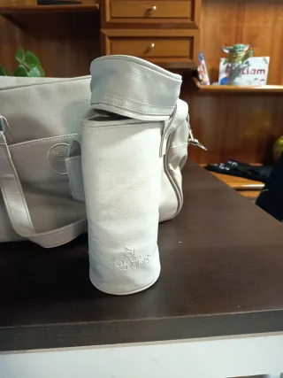 Pañalera gris regalo porta biberón termico