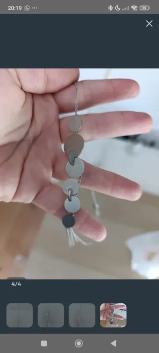 Collar plateado con discos y flecos