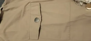 Cazadora fina mujer beige con flecos y abalorios