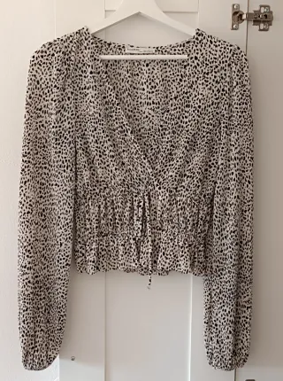 Blusa Pull&Bear estampado animal print