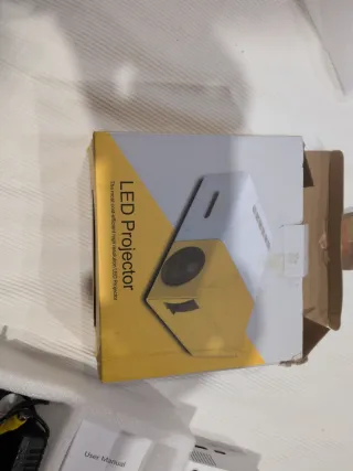 Proyector LED Naranja y Blanco.En garantía amazon