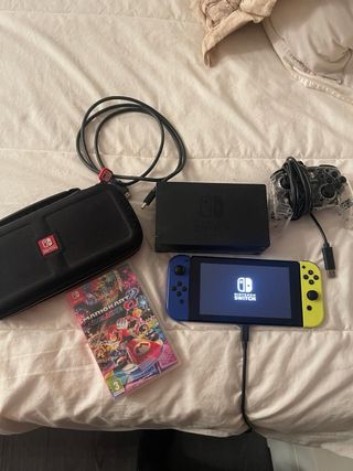 Nintendo Switch + accesorios + juegos