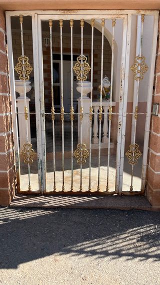 Valla y puerta de forja de ancho 5.50 largo125.