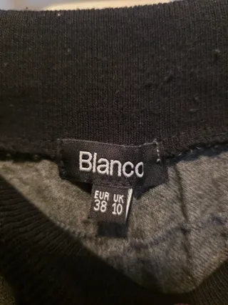 Pantalones grises con cremallera