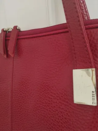 Bolso de mano rojo Dissel.