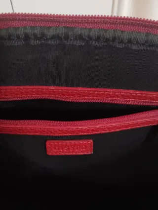 Bolso de mano rojo Dissel.
