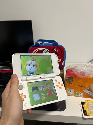 New Nintendo 2DS XL Blanca y Naranja completa