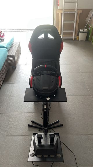 Simulatore di guida Thrustmaster con sedile bucket Corsa