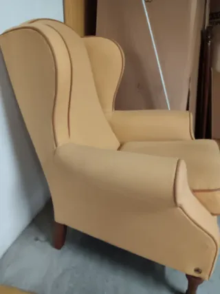 Elegante sillón individual de tela