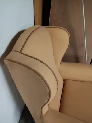 Elegante sillón individual de tela