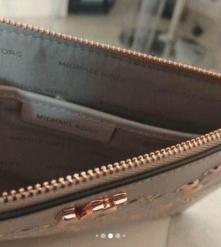 Pochette Michael Kors rosa cipria con borchie