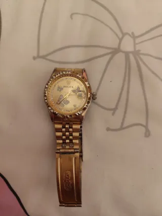 Reloj Rolex Dorado con Diamantes